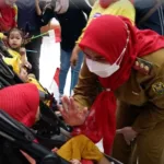 Walikota Bandar Lampung, Hj. Eva Dwiana Hadir Dalam Acara Peringatan Hari Anak Nasional