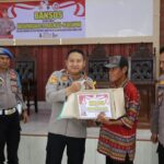 Polres Mesuji Gelar Bansos di Desa Mulya Agung, Rangkaian HUT Bhayangkara Ke-78