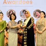 Rektor UMITRA, Armalia Reny, Menerima Penghargaan Internasional, Most Outstanding Women Enterpreneur ASEAN, AWEN Award, di Kamboja