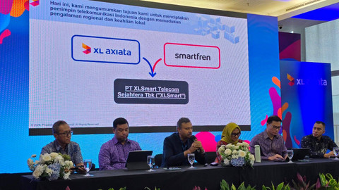 Vivek Sood, Group Chief Executive Officer Axiata Group, memaparkan kesepakatan merger XL dan Smartren. Foto: kumparan