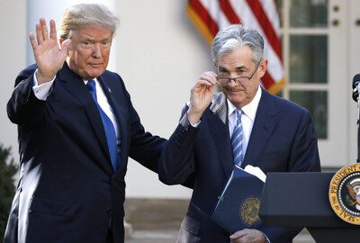 Donald Trump dan Jerome Powell Foto: Carlos Barria/Reuters